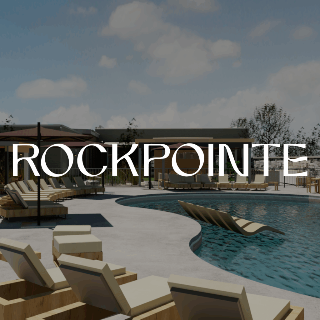 Thrive Companies, Outdoor pool area with lounge chairs and modern seating, set against a building and trees under a partly cloudy sky at Tillmore at Quarry Trails. The word ROCKPOINTE is overlaid across the image. Apartments in Columbus Ohio