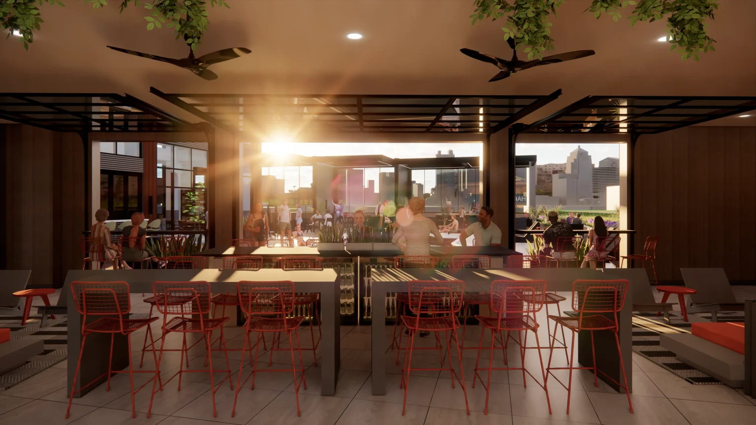A modern, open-air restaurant nestled among Columbus apartments features red chairs and tables. Diners are seated, enjoying the sunset through expansive windows in a vibrant, urban setting.