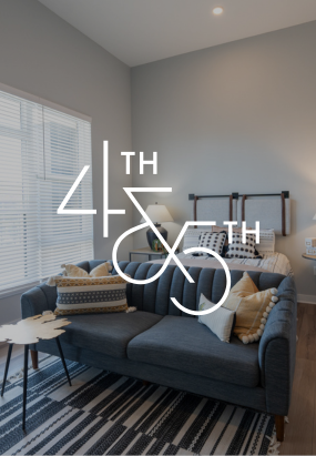 A modern bedroom with a gray couch, striped rug, and bed with pillows. Large white text showing “4th” and “5th” is overlaid on the image.