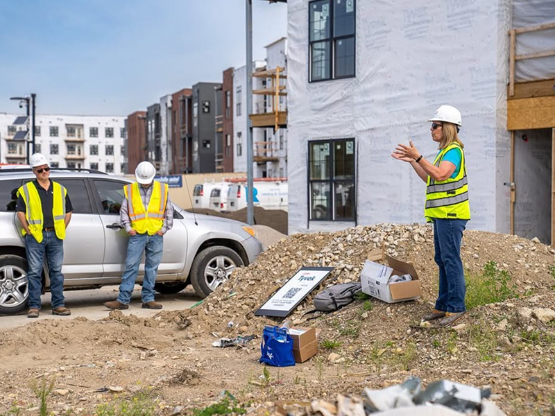 Construction workers collaborating on a job site