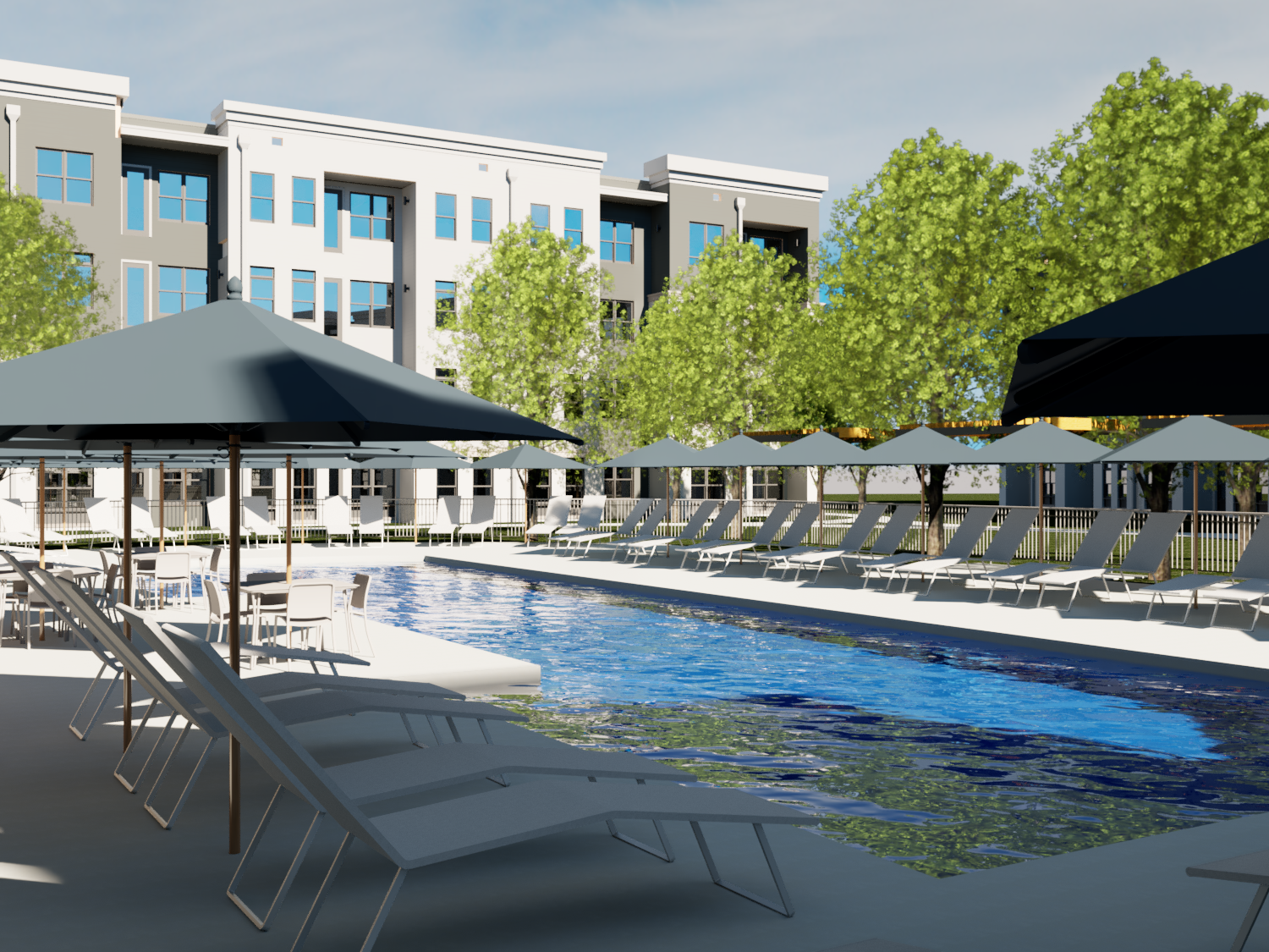 Thrive Companies, Outdoor swimming pool area with lounge chairs and umbrellas, surrounded by trees and a multi-story apartment building in the background. Apartments in Columbus Ohio