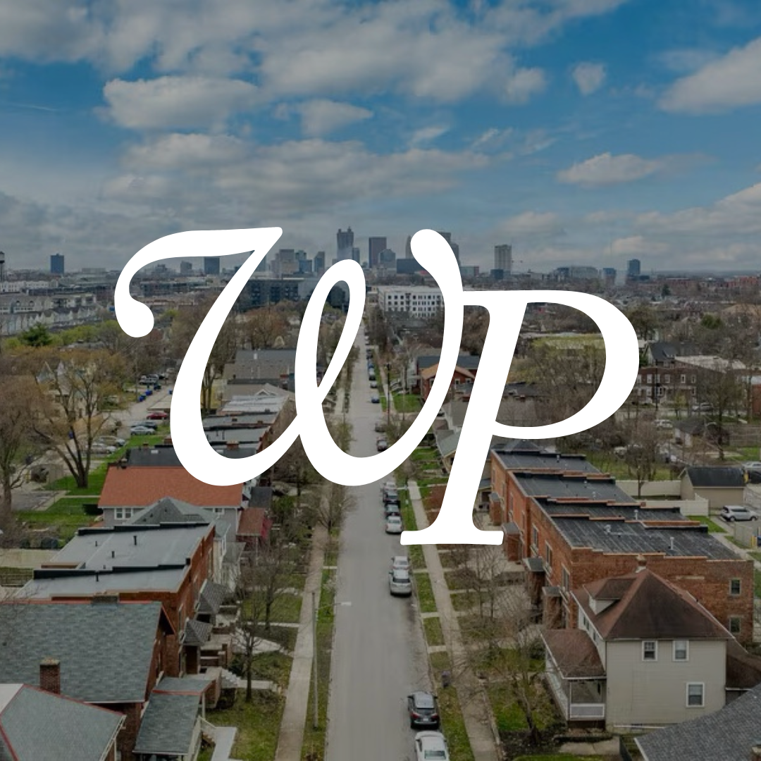 Thrive Companies, Aerial view of a residential neighborhood with city skyline in the background; large white WP letters overlaid in the center. Apartments in Columbus Ohio