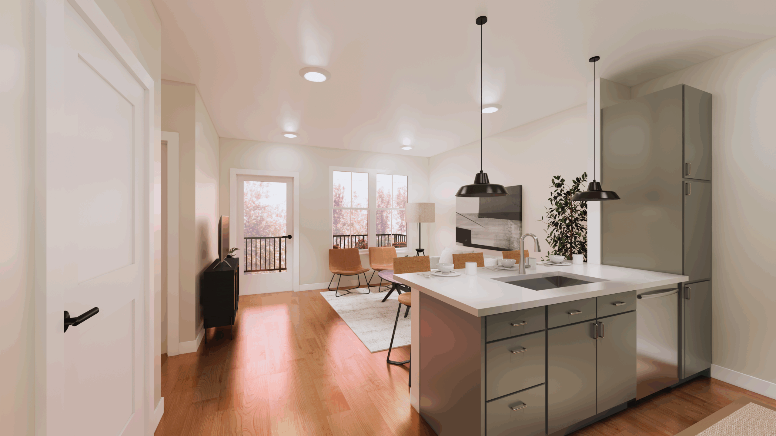 Modern open-concept kitchen and living room at The Michael at GVX with island, pendant lights, dining table, sofa, TV, and large windows letting in natural light.