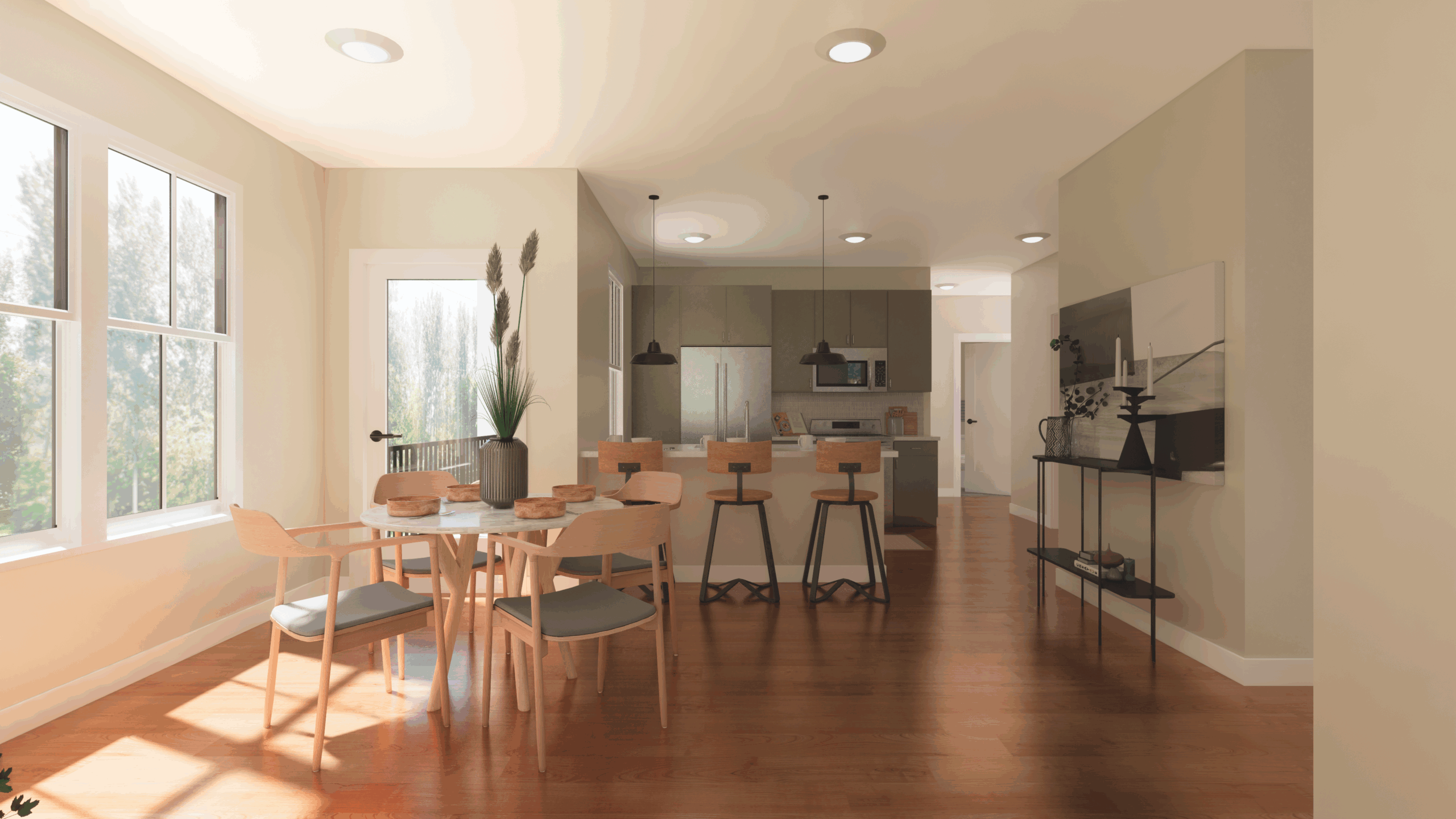 A modern dining and kitchen area at The Michael at GVX features wooden floors, a round dining table with chairs, bar stools at a kitchen island, large windows, and neutral-colored walls.